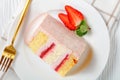 A slice of a pink strawberry cheesecake Royalty Free Stock Photo