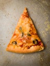 Slice of pizza on pan Royalty Free Stock Photo