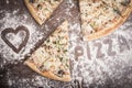 A slice of pizza on a wooden background Royalty Free Stock Photo