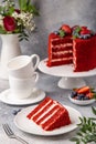 Slice of Red Velvet cake on white plate