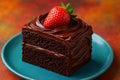 A slice of rich chocolate cake with two layers, topped with smooth chocolate icing. Royalty Free Stock Photo