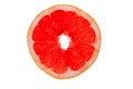Slice of ruby grapefruit on white Royalty Free Stock Photo