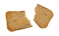 Slice of rye melba toast broken in half on a white background