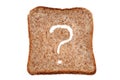 Slice of sandwich bread with a question mark close-up on a white background