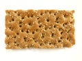 Slice of sesame cracker isolated on white background