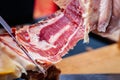Slice of slice of ham close-up. Spanish ham, Jamon Serrano, Italian Prosciutto, selective focus