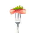 Slice of smoked ham on fork Royalty Free Stock Photo
