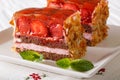 slice of strawberry cake with fresh mint closeup on a plate. horizontal Royalty Free Stock Photo