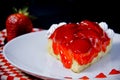 Slice of strawberry cake with jelly and cream Royalty Free Stock Photo