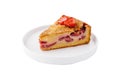 Slice of strawberry cake lying on white plate Royalty Free Stock Photo