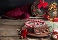 Slice of sweet chocolate cake for Christmas Eve. Royalty Free Stock Photo