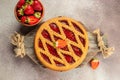 Slice of tart strawberry jam, italian pie crostata on a wooden board. place for text, top view Royalty Free Stock Photo