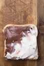 Slice of toast bread with walnut and cocoa milk spread Royalty Free Stock Photo