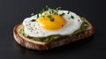 toasted bread topped with mashed avocado and a poached egg, garnished with microgreens isolated on white background Royalty Free Stock Photo