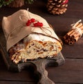slice traditional European cake Stollen with nuts and candied fruit