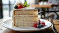 Slice of Tres Leches cake on a Parisian cafe table, bathed in warm afternoon sunlight.