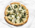 Slice of vegetarian potato, kale cabbage, mozzarella cheese pizza on a light background, top view Royalty Free Stock Photo