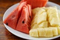 Slice of watermelon and pineapple on the plate. Royalty Free Stock Photo