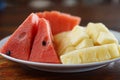 Slice of watermelon and pineapple on the plate. Royalty Free Stock Photo