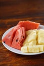 Slice of watermelon and pineapple on the plate. Royalty Free Stock Photo