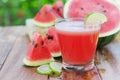 slice of watermelon for smoothies with lime on woods Royalty Free Stock Photo