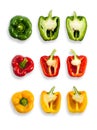 Slice and whole green, red, yellow bell peppers isolated on a white background, top view with clipping path. Royalty Free Stock Photo