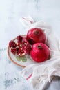 Slice and whole pomegranates