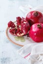 Slice and whole pomegranates