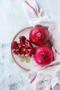 Slice and whole pomegranates