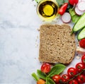 Slice of a whole wheat bread and healthy food Royalty Free Stock Photo