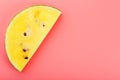 Slice of Yellow watermelon on a pink background. Bright summer background Royalty Free Stock Photo