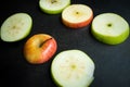 Sliced apple on a black surface Royalty Free Stock Photo