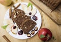 Sliced apple cinnamon bread. with decorations on wooden table. Made from apples, sugar, oil, eggs, flour. Homemade apple loaf cake