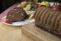 Sliced apple cinnamon bread. with decorations on wooden table. Made from apples, sugar, oil, eggs, flour. Homemade apple loaf cake Royalty Free Stock Photo