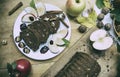 Sliced apple cinnamon bread. with decorations on wooden table. Made from apples, sugar, oil, eggs, flour. Homemade apple loaf cake