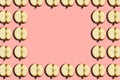 Sliced apple pattern on pink background, minimal concept