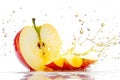 Sliced of apple with splashing juice on white background Royalty Free Stock Photo