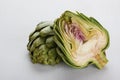 Sliced artichoke on white table Royalty Free Stock Photo