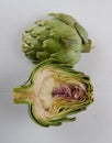 Sliced artichoke on white table Royalty Free Stock Photo