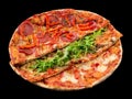 Assorty pizza from three different pizzas isolated on black background