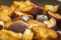 Sliced aubergines frying in a pan Royalty Free Stock Photo
