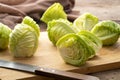 Sliced Baby Cabbage Chick on wooden chopping board