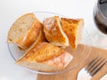 Sliced baguette in glassy plate