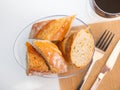 Sliced baguette in glassy plate