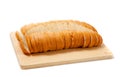 Sliced baked french bread on white