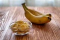 Sliced banana in bowl on wooden table Royalty Free Stock Photo