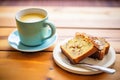 sliced banana bread with a cup of coffee