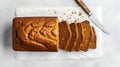 Sliced banana cake on a white background. Top view. Generative AI