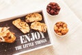 Sliced banana nut bread. Cake with nuts on wooden board. Morning breakfast background. Baked home desert. Close up view. Close up Royalty Free Stock Photo