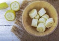 Sliced banana ,top view on white wooden background Royalty Free Stock Photo